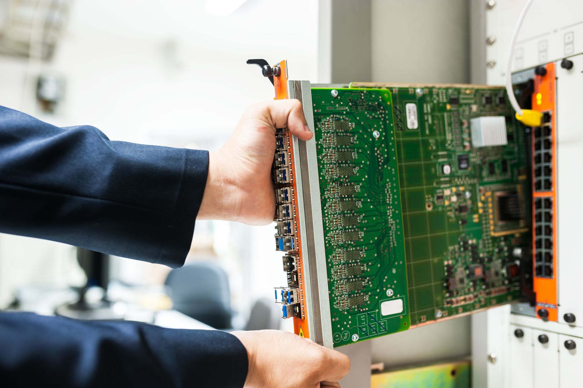 Network engineer analyzing fiber nodes